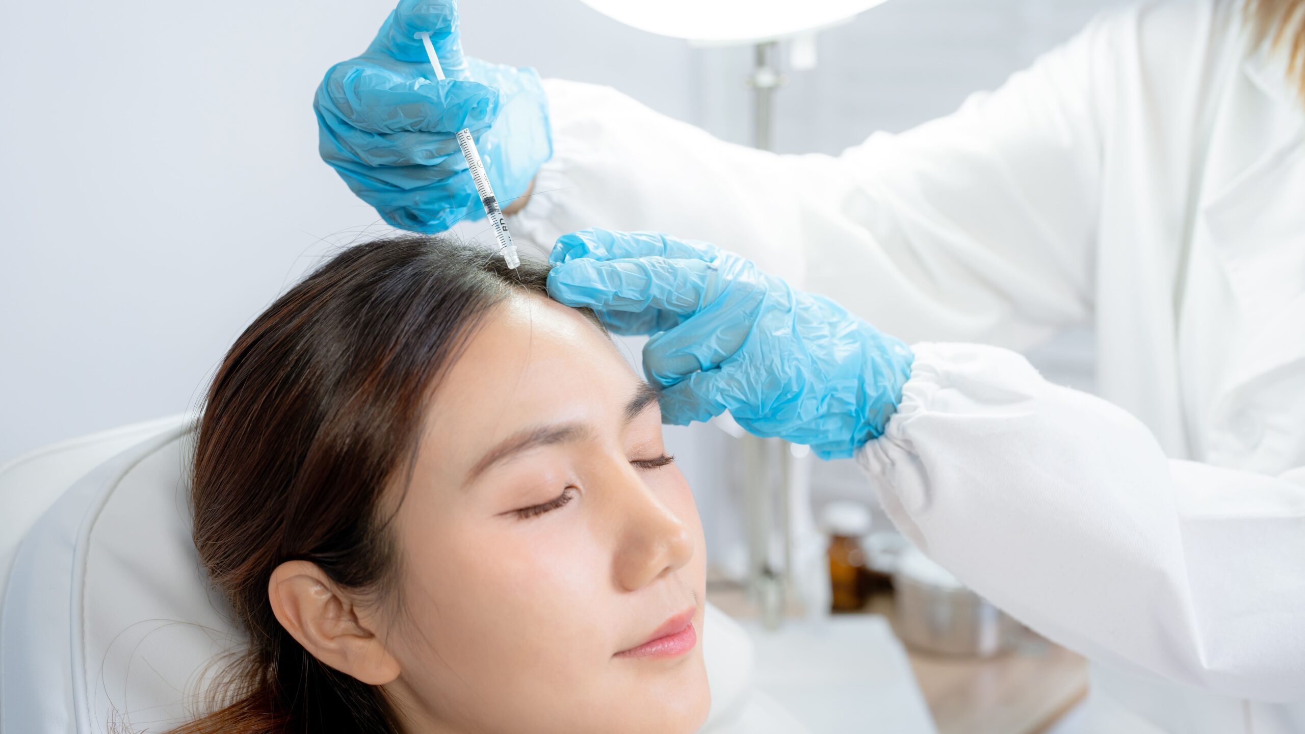 asian-woman-enters-a-cosmetic-medicine-clinic-ski-2026-06-25-21-48-20-utc_Crop Image (1)