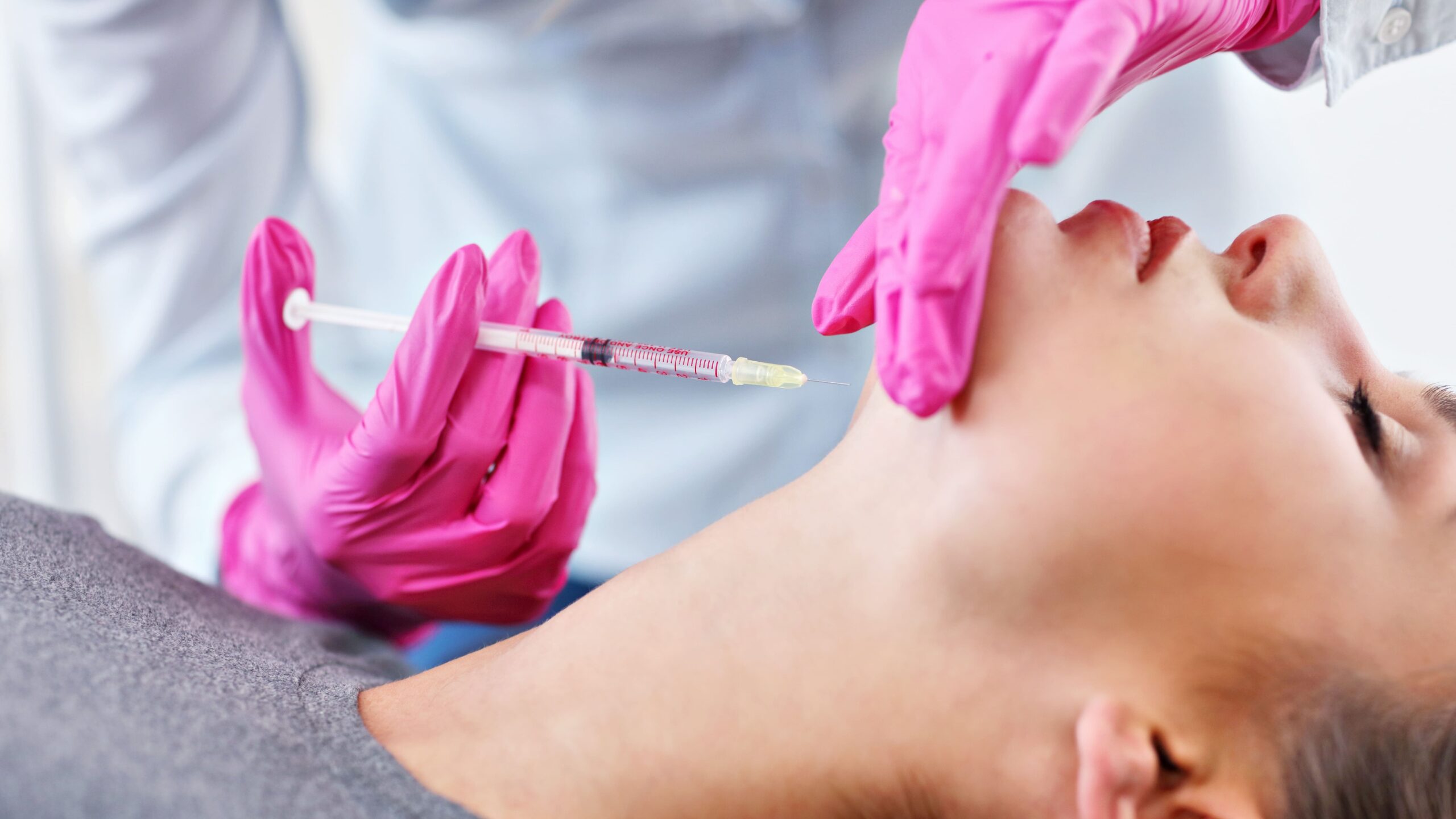 woman-receiving-injection-in-chin-at-beauty-clinic-2026-03-17-04-23-41-utc_Crop Image (1)