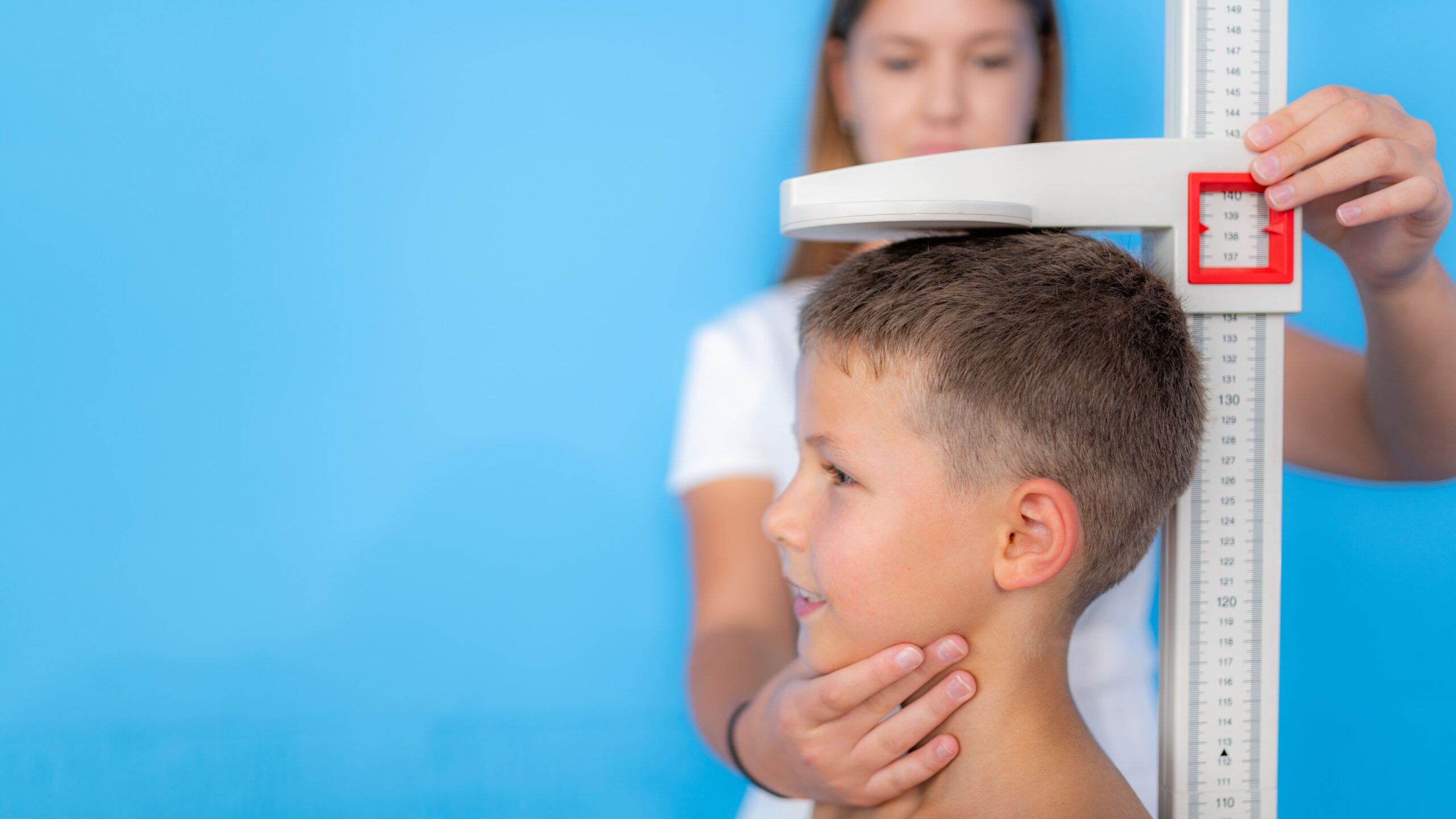 boy-having-height-measured-by-medical-professional-2026-03-10-03-54-53-utc (1)