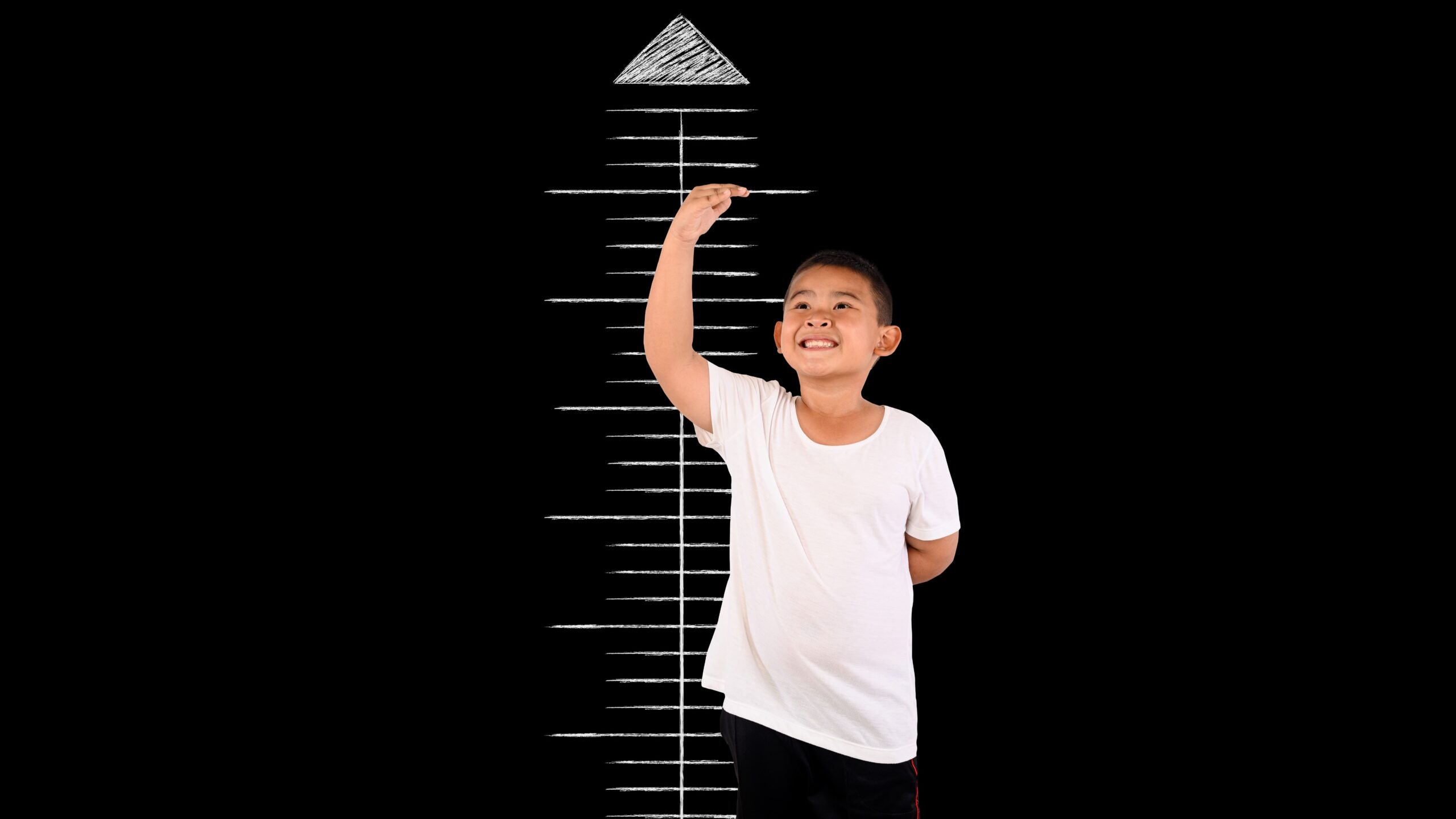 young-boy-measures-his-height-on-dark-background-2026-03-26-06-12-25-utc_Crop Image (1)